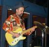 George (in a wicked shirt) turns it up!